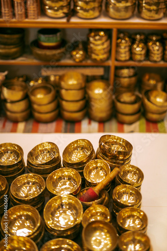 Different singing bowls in a musical shop in India