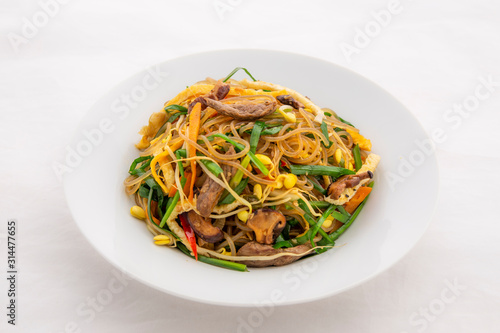 Stir fried Korean glass noodle with soy sauce called Japchae