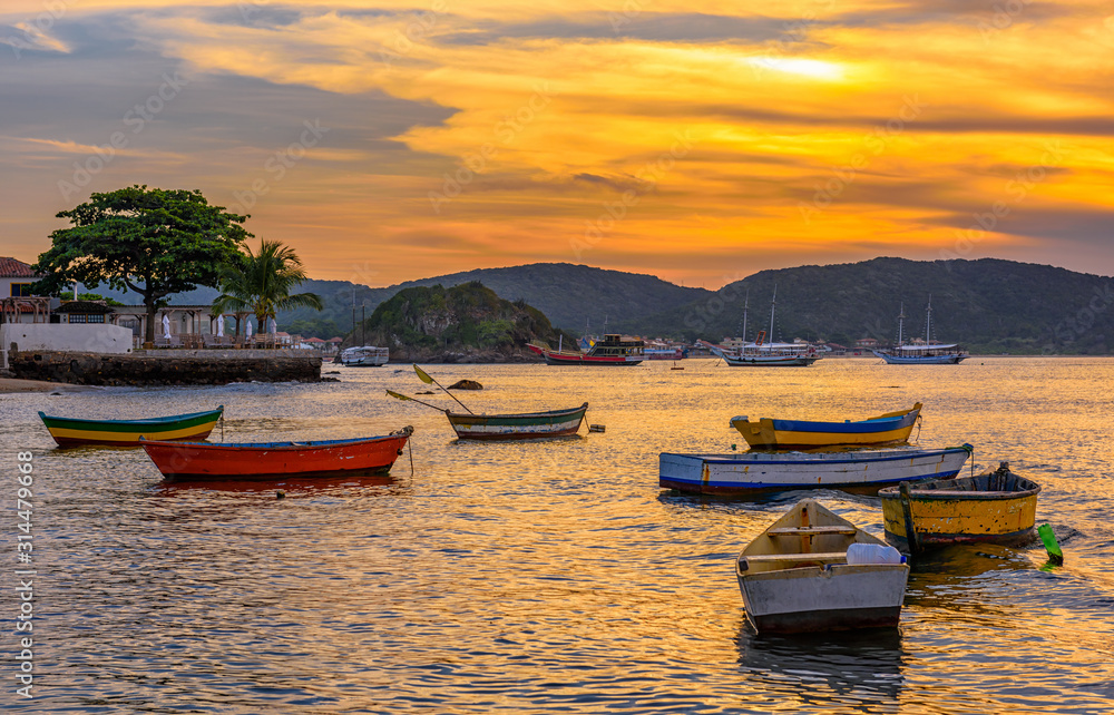 Sunset in Buzios. Rio de Janeiro, Brazil. Sunset seascape with boats in Buzios.