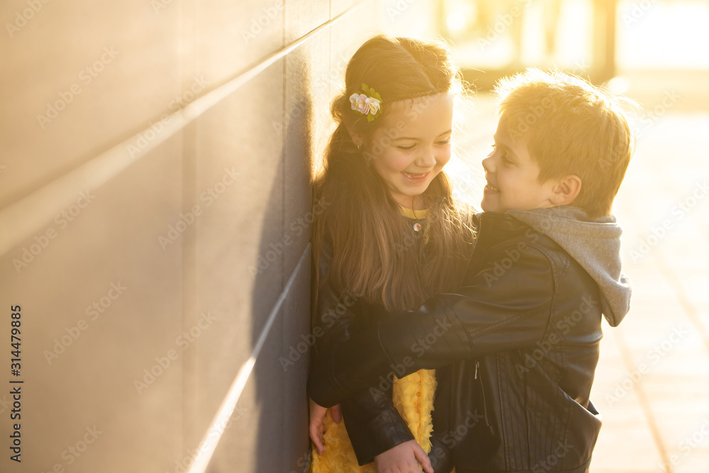 Fototapeta premium Boy and girl on a walk
