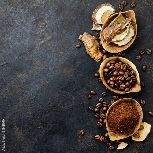 Mushroom Chaga Coffee Superfood Trend-dry and fresh mushrooms and coffee beans on dark background