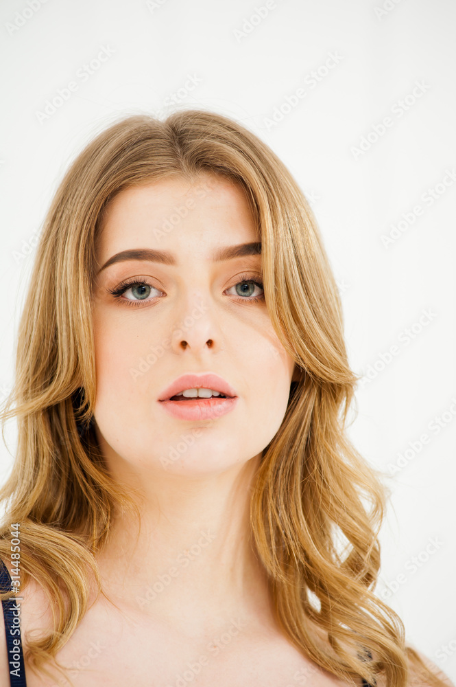 Gentle portrait of young healthy blond woman underwear near light window Gentle portrait of young healthy blond woman underwear near light window