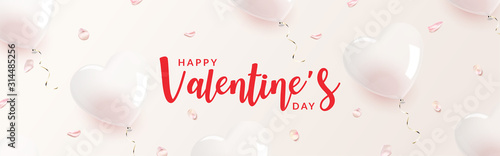 Heart shaped transparent balloon with rose petals banner