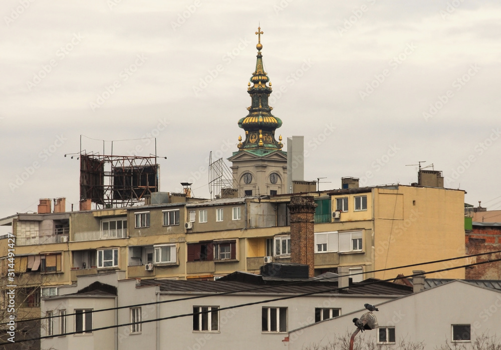 Belgrade rooftops with the Dome of the Holy Archangel Michael church in the background.