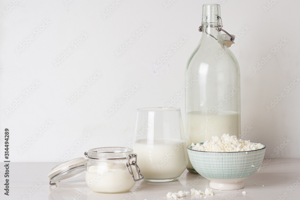 different milk products on a white background different milk products on a white background