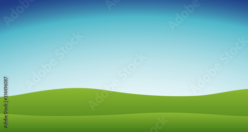 Background scene with blue sky and green grass