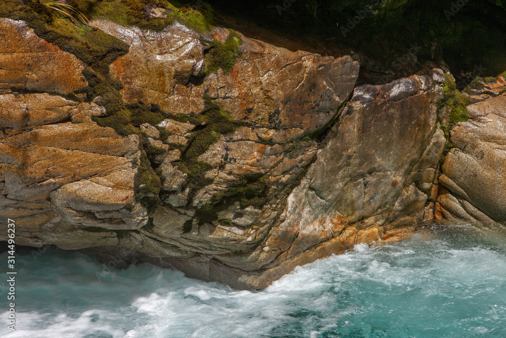 Millford Sound. Fjordland. New Zealand. Creek rocks