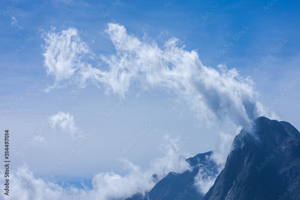 Millford Sound. Fjordland. New Zealand. Mountains snow.