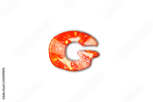 English letter " G " made from tomatoes