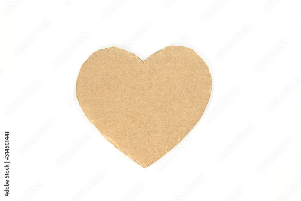 Cardboard heart on a white isolated background. Stock photo for the day of St. Valentine with empty space for your text. For web, print, postcards and wallpaper Cardboard heart on a white isolated background. Stock photo for the day of St. Valentine with empty space for your text. For web, print, postcards and wallpaper