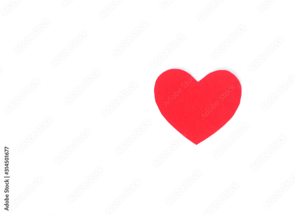 Оne red felt heart on a white isolated background. Stock photo for the day of St. Valentine with empty space for your text. For web, print, postcards and wallpaper.
