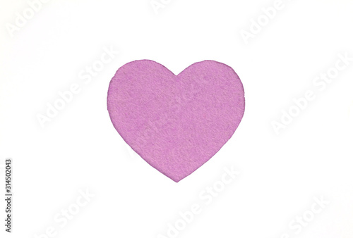   ne felt violet heart on a white isolated background. Stock photo for the day of St. Valentine with empty space for your text. For web  print  postcards and wallpaper.