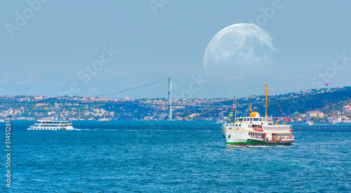 Water trail foaming behind a passenger ferry boat in Bosphorus, Istanbul, Turkey "Elements of this image furnished by NASA