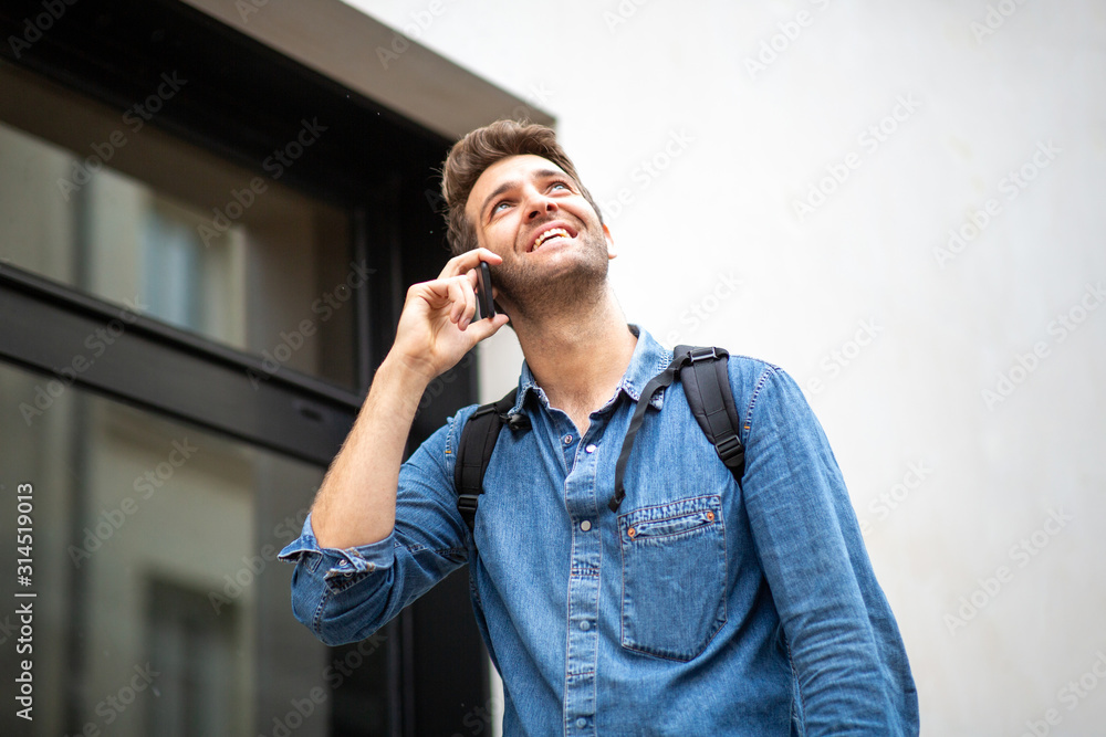 middle age man talking with cellphone outside middle age man talking with cellphone outside