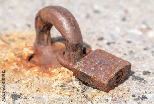 corroded rusty old padlock