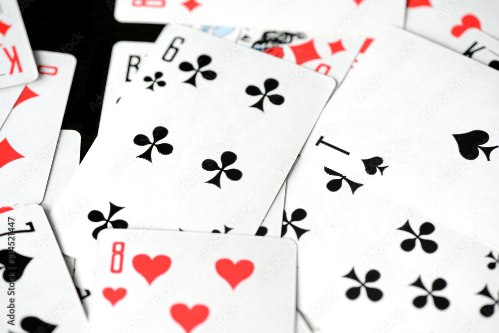 Playing cards on a black background close-up. Gambling Concept Playing cards on a black background close-up. Gambling Concept