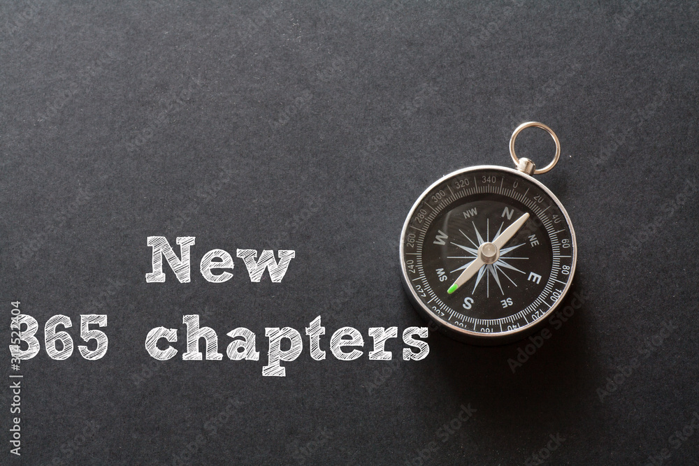 New 365 Chapters written with Compass on black paper background New 365 Chapters written with Compass on black paper background
