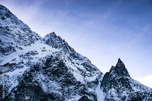 Landscape in the mountains. Beautiful peaks of snowy mountains © Vladyslav