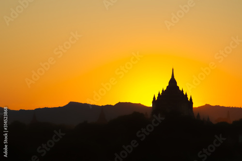 sunset in bagan myanmar with pagoda
