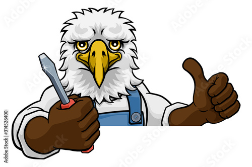 An eagle electrician, handyman or mechanic holding a screwdriver and peeking round a sign
