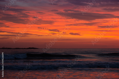 sunset over the sea © Helinton