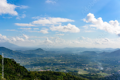 Panoramic view to mountains, tropical forest, Yanoda Park and Sanya city. Rainforest cultural tourism zone Yanoda, Hainan island, Yalong Bay Tropical Paradise Forest Park. China. © Evgeniy