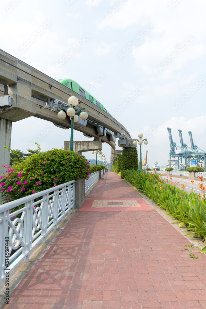 Sentosa adjacent walkway beside the tracks.