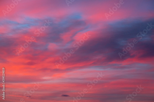 Morning sky with different colors. Colorful dawn in the mountains. © beverli
