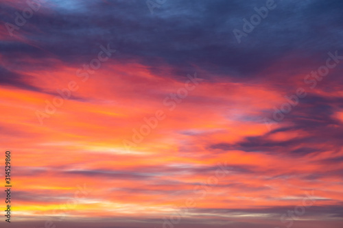 Morning sky with different colors. Colorful dawn in the mountains. © beverli