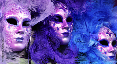 carnival mask on a Violet  background © corradobarattaphotos