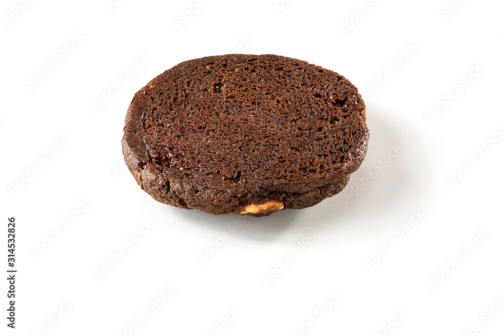 Upside down chocolate chip cookie with white chocolate, isolated on white background Upside down chocolate chip cookie with white chocolate, isolated on white background