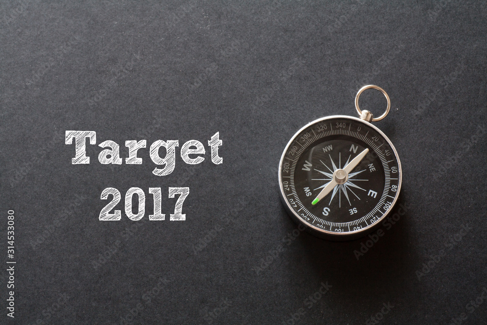 Target 2017 written with Compass on black paper background Target 2017 written with Compass on black paper background