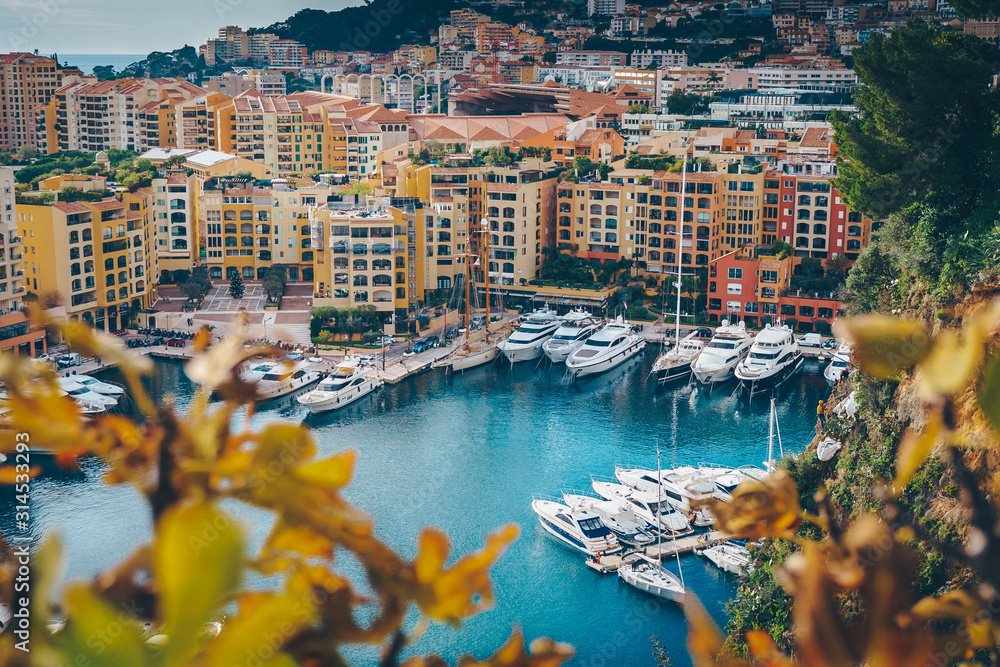 Aerial view of Monaco port. Port Fontvieille, Monaco Ville, topview from Monaco Ville, azure water, harbor, luxury apartments, yachts. view of yachts in Port Hercules, Monaco.