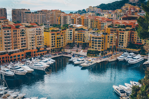 Monaco Fontvieille cityscape of French Riviera. topview from Monaco Ville, azure water, harbor, luxury apartments, yachts. Port Fontvieille. © Natallia