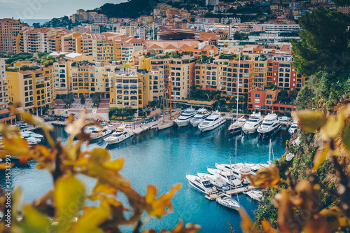 Aerial view of Monaco port. Port Fontvieille, Monaco Ville, topview from Monaco Ville, azure water, harbor, luxury apartments, yachts. view of yachts in Port Hercules, Monaco.