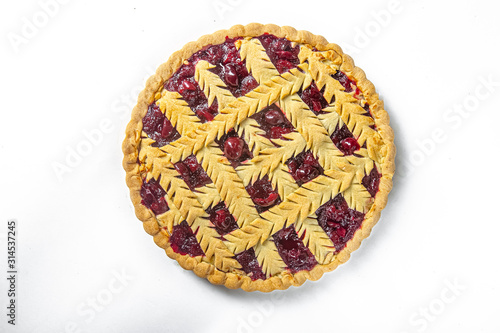 white isolated background, sweet red pie, with cherry strawberries, with berries photo