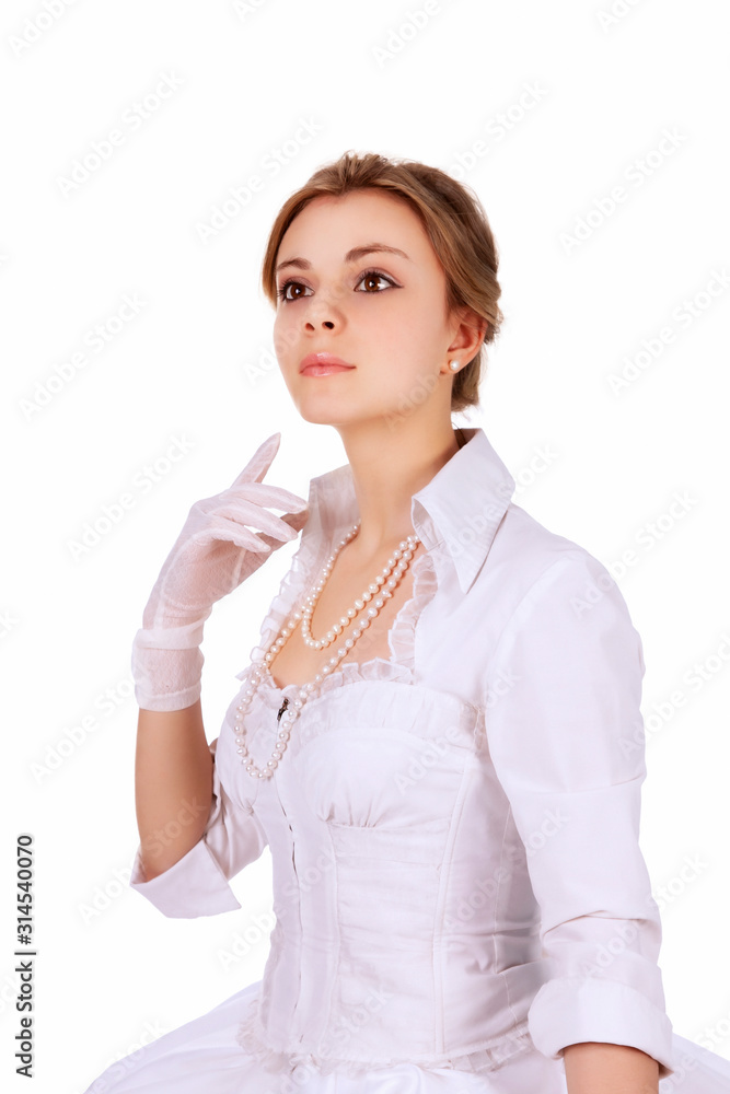 Portrait of a charming girl in a white dress in retro style, the bride in a retro dress. Portrait of a charming girl in a white dress in retro style, the bride in a retro dress.