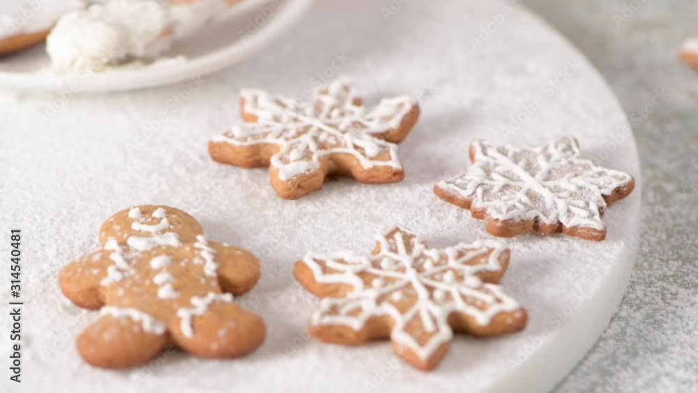 Christmas cookies on kitchen countertop with festive decorations. Christmas cookies on kitchen countertop with festive decorations.