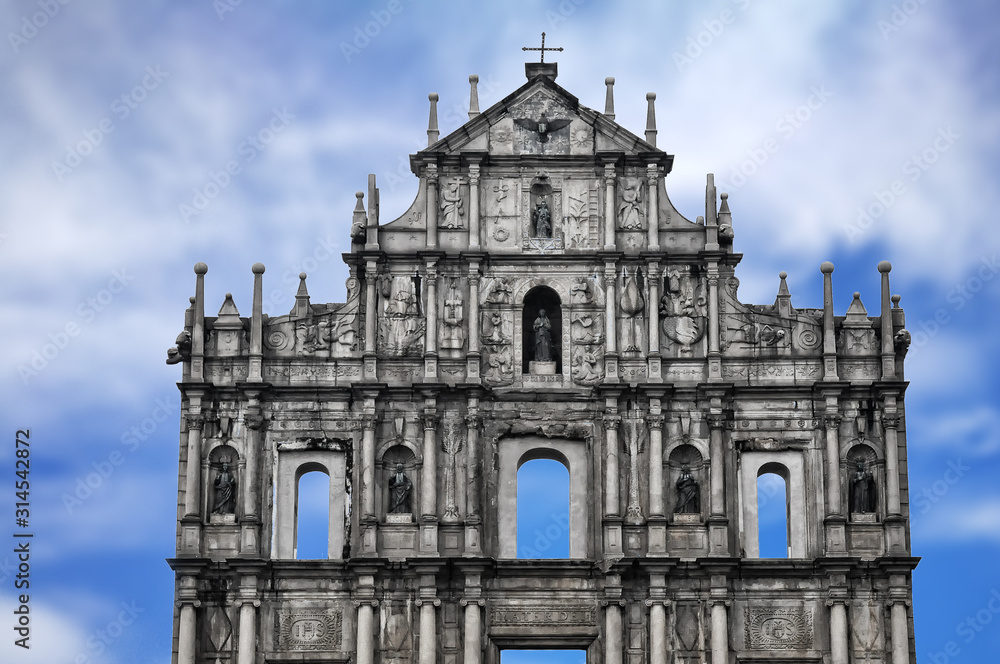 Ruins of St. Paul's Church building in Macau on blue sky background, China.