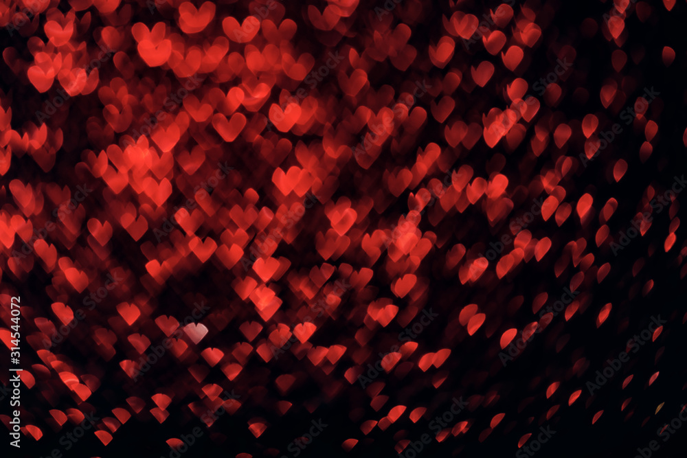 Valentine's day red background on black. Hearts shape bokeh. Overlay layer.