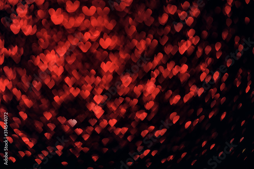 Valentine s day red background on black. Hearts shape bokeh. Overlay layer.