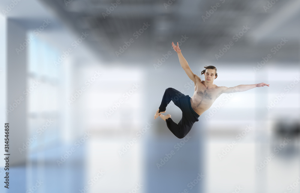 Fototapeta premium Dancer guy in jump. Mixed media