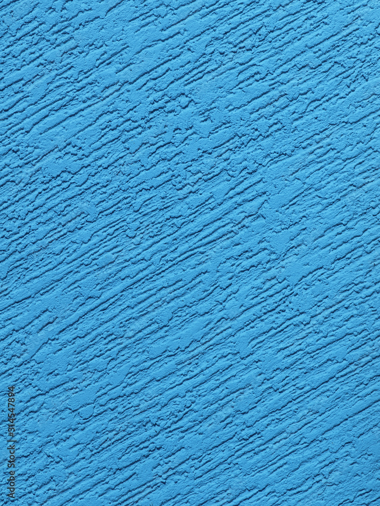 Blue background facade plaster . Monolithic plaster decorative backdrop. Single layer scraped cement plaster wallpaper. Exterior building structure backdrop. Silica sand cement wall plaster Blue background facade plaster . Monolithic plaster decorative backdrop. Single layer scraped cement plaster wallpaper. Exterior building structure backdrop. Silica sand cement wall plaster