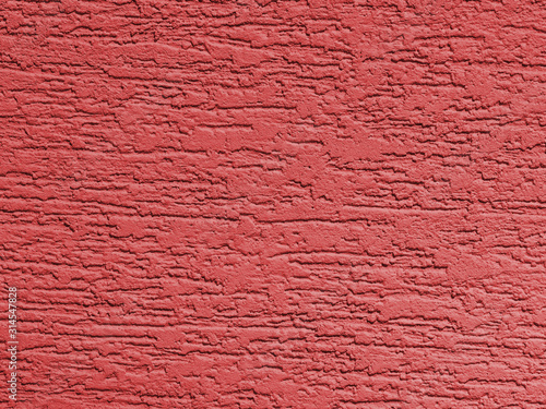 фотографія Red background facade plaster