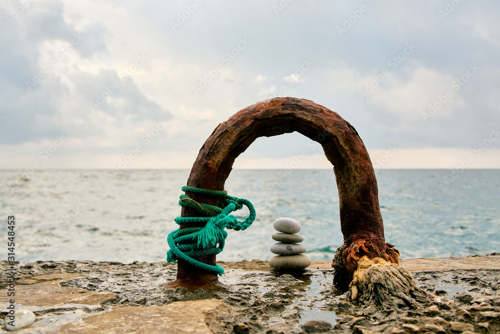 Fototapeta premium Balance, peace of mind, different sizes stones form a pyramid.