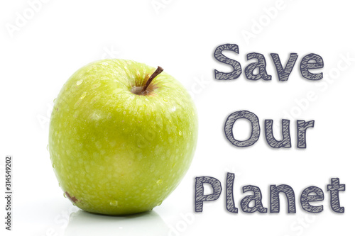Save Our Planet words written on isolated background with fresh green apple
