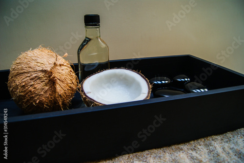 coconut, massage, sand, oil, coconut oil, obsidian, rocks, hot stones, alternative therapies, relaxation, meditation, decoration, interior, fruits, sea, beach, bottle, glass,