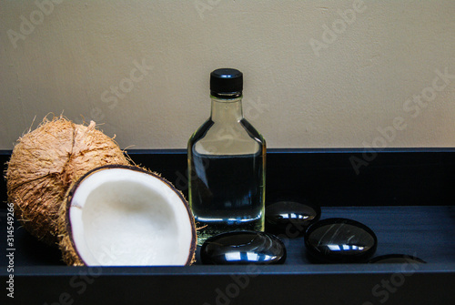 coconut, massage, sand, oil, coconut oil, obsidian, rocks, hot stones, alternative therapies, relaxation, meditation, decoration, interior, fruits, sea, beach, bottle, glass,