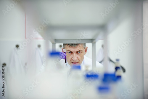 Laboratory scientist researching chemical compositions