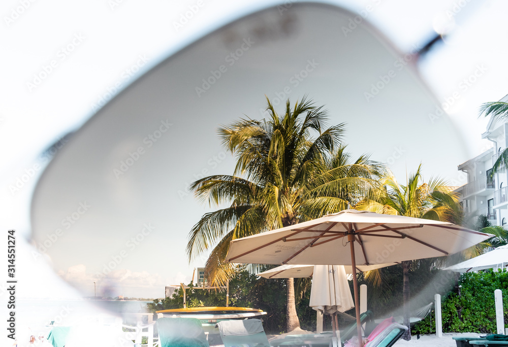 Tropical beach looking through sun glasses